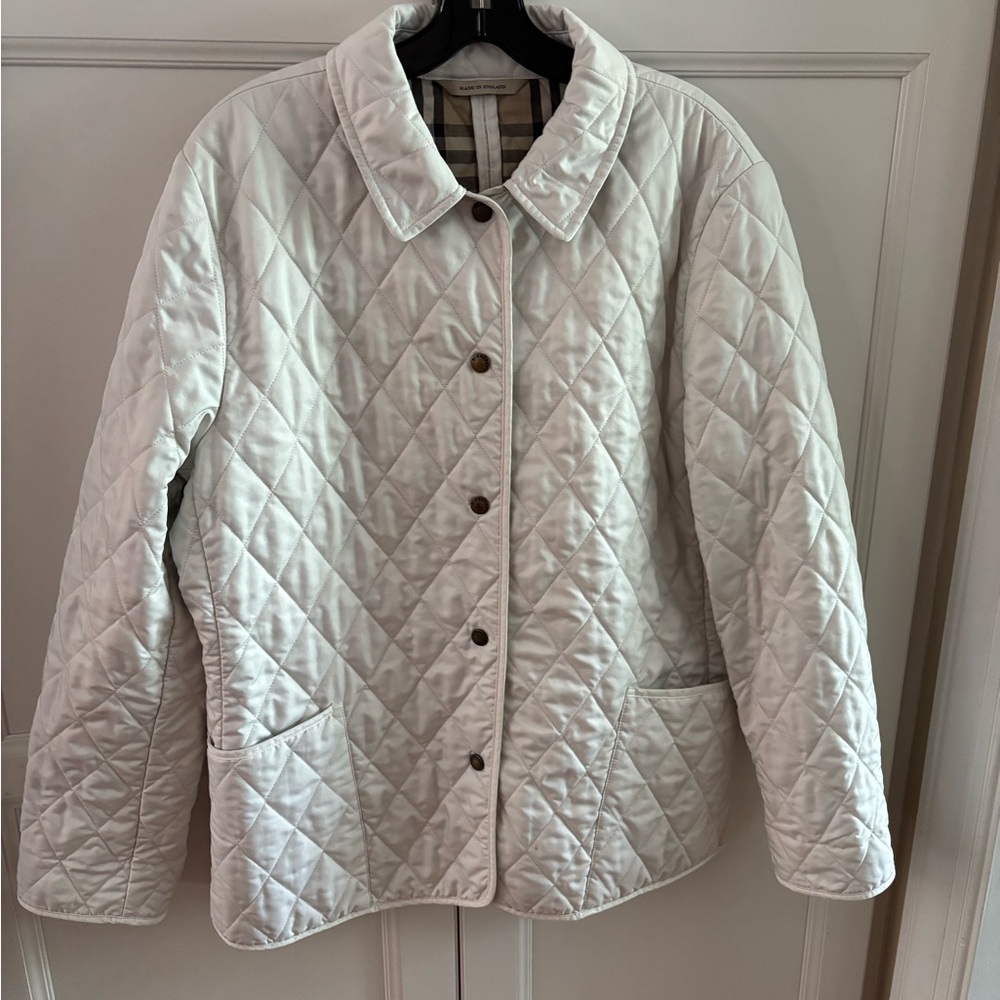 Burberry Cream Quilted Nylon Jacket Similar one retails for $1,095.